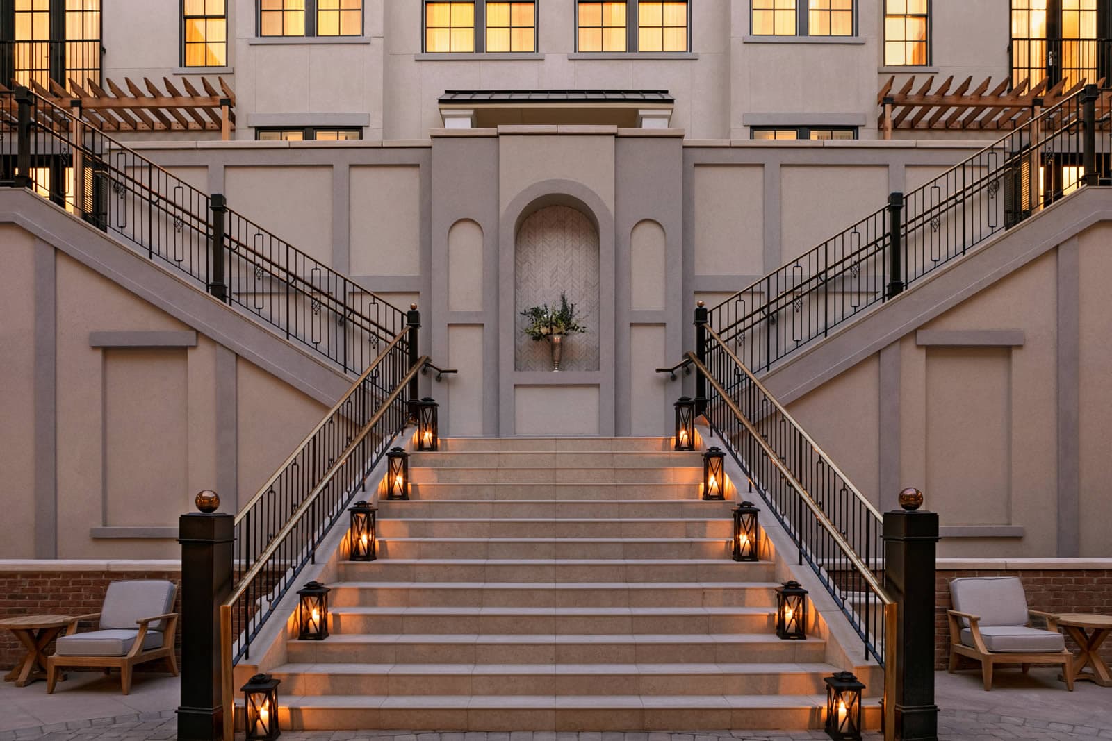The lantern-lit courtyard staircase at The Harpeth at dusk